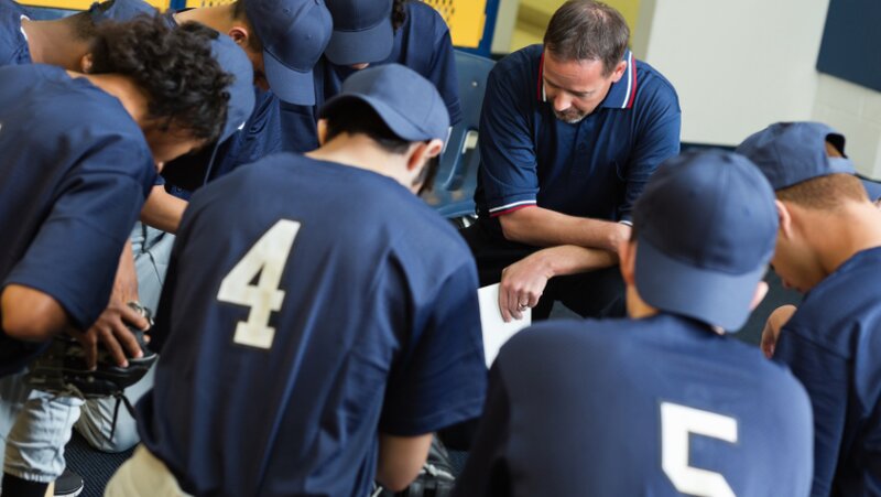 Motivación antes del partido : un coach en acción